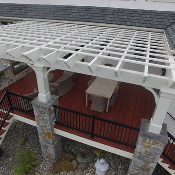 Zuri Deck with Cedar Pergola and Stone Fireplace with Grill