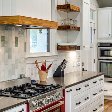 Kitchen - Red Oven and Stainless Appliances