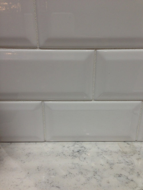 Beveled white subway tile with beveled lyra countertop?