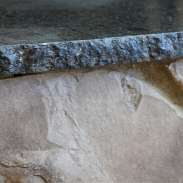 Little Eden Fireplace, Leathered Granite with Chiseled edge