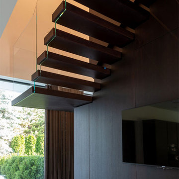 Moderne Kragarmtreppe als Raumtrenner