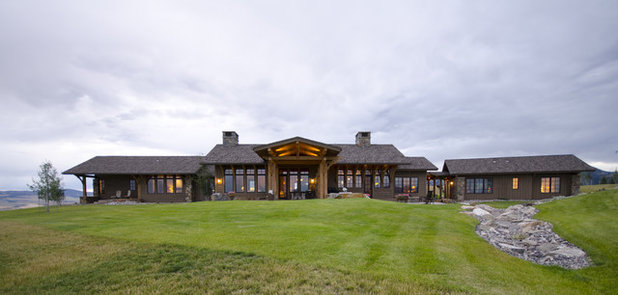 Rustic Exterior by Teton Heritage Builders