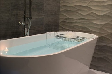 Bathroom - mid-sized modern master white tile and porcelain tile porcelain tile bathroom idea in San Diego with an undermount sink, black cabinets, quartz countertops, gray walls, flat-panel cabinets and a two-piece toilet