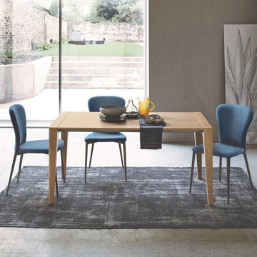 Taller fixed extending oak dining table by Sedit