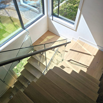 Project #129 | Modern White Oak Staircase with Slanted Risers