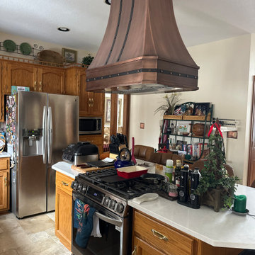 Custom Copper Vent Hood with Traditional Metal Strap Detailing