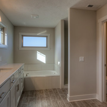 Custom Newport w/ side-load garage and master w/ sitting room