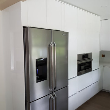 Full-Height Cabinetry Wall with Integrated Appliances – Upper Lonsdale