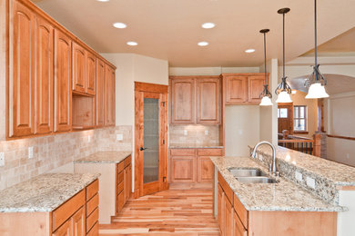 Example of an arts and crafts kitchen design in Denver