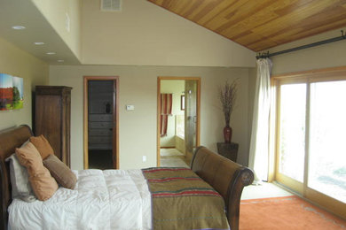 Large elegant master bedroom photo in San Luis Obispo with beige walls and no fireplace