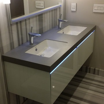 Floating vanity with Neolift, top w/ 45 degree mitered edge profile.
