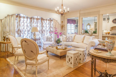 Example of a transitional living room design in Raleigh