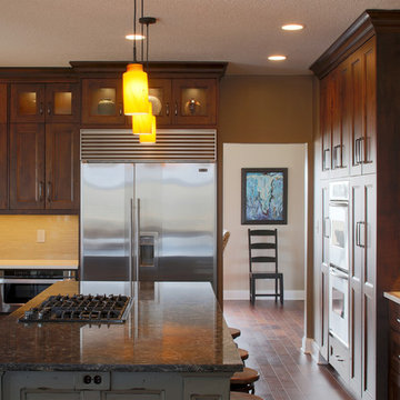 Stained Alder perimeter cabinetry with distressed/painted island.