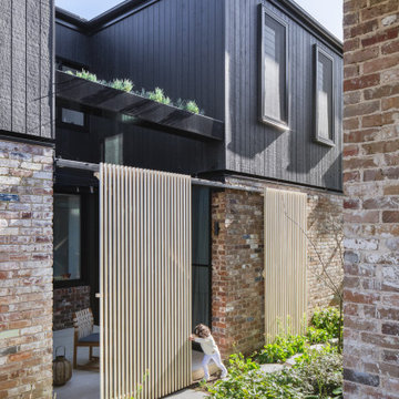 Sustainable House - sliding timber privacy screen