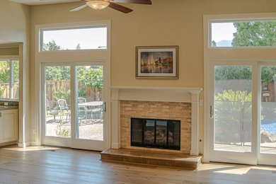 Example of a 1950s medium tone wood floor family room design in San Francisco