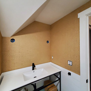 Wallpapering in a bathroom with grasscloth material