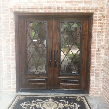 Wood Doors with Wrought Iron