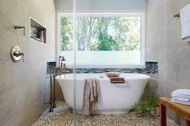 Large transitional freestanding bathtub photo in DC Metro