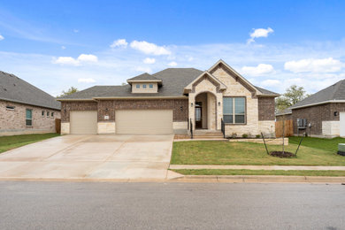 Example of a transitional exterior home design in Austin