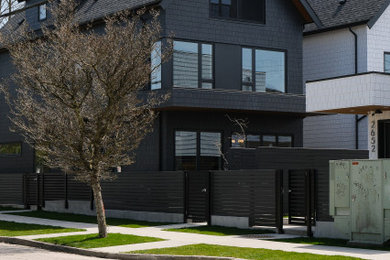 Example of a minimalist exterior home design in Vancouver