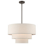 Livex Lighting - Livex Lighting Gladstone 4-Light English Bronze Pendant Chandelier - The Gladstone pendant chandelier is both modern and versatile. The hand-crafted oatmeal colored fabric hardback shade is set off by the silky white fabric on the inside setting a pleasant mood. The four-light triple drum shade adds character to this handsomely styled pendant. Perfect fit for the living room, dining room, kitchen and bedroom. This sleek design is shown in an english bronze finish.