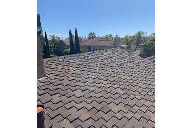 Inspiration for an exterior home remodel in Orange County with a hip roof and a shingle roof
