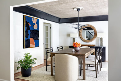 Inspiration for a transitional wallpaper ceiling enclosed dining room remodel in Baltimore with white walls