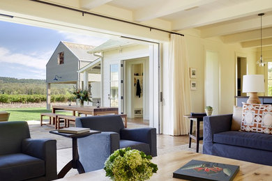 Living room - farmhouse living room idea in San Francisco with white walls
