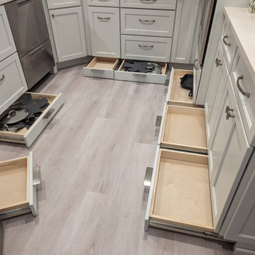 Small kitchen with storage options in toe kick