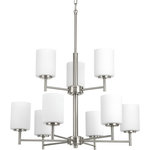Progress Lighting - Replay Collection Nine-Light Chandelier, Brushed Nickel - Replay features a linear form that provides a pleasingly elegant accent to your home. A sleek, metallic finish is complemented by white glass diffusers for a clean, modern silhouette.