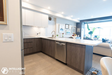 Inspiration for a medium tone wood floor kitchen remodel in Toronto