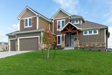Large rustic beige two-story mixed siding house exterior idea in Kansas City