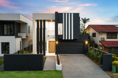 Photo of a contemporary home design in Brisbane.