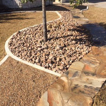 Natural edge Flagstone pathway w/ Xeriscape