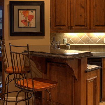 Inset cabinetry with stained Alder and painted/glazed finishes