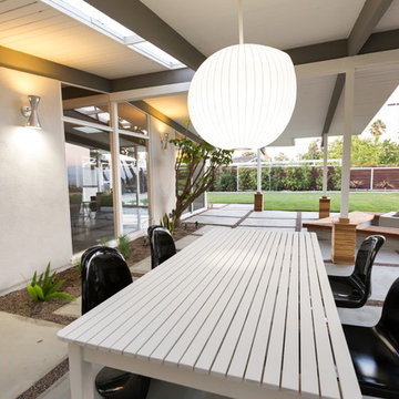 Black Panton Chairs with Globe Pendant