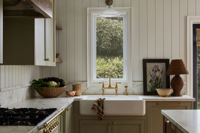 Inspiration for a huge cottage eat-in kitchen remodel in Toronto with an island