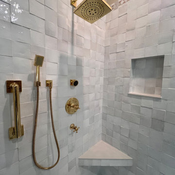 Zellige Tile Amplifies the Warm Luster of the Old-World Style Brass Fixtures