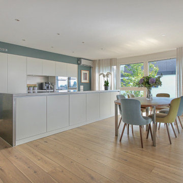 Open plan living/dining/kitchen Erlenbach Zürich.