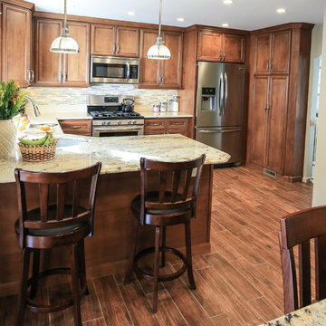 Spacious Transitional Kitchen Remodel | Wood Cabinets & Stone Accent Wall