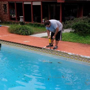 Pool deck and water line tile project
