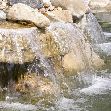 Garden waterfall with boulders