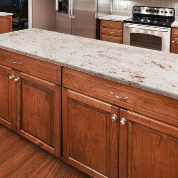 Traditional Chestnut Cherry Kitchen in Reston, VA