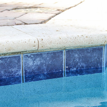 AFTER WITH PAVERS PUT IN: Pool with firepit, english garden, large patio areas