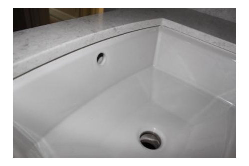 sealing bathroom sink to countertop