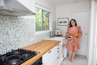 Photo of a small country home design in Sunshine Coast.