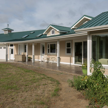 Family Room and Garage Addition to Create a Windscreen for Outdoor Entertaining