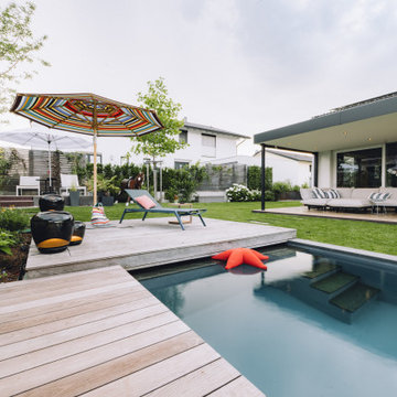 Familiengarten mit Naturpool und Feuerstelle