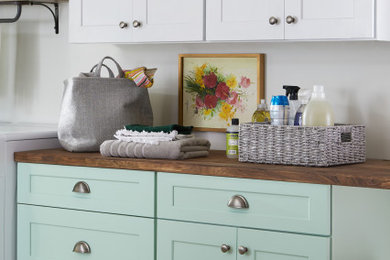 Laundry room - eclectic laundry room idea in Other