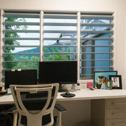 Breezway Louvres provide outdoor views in the home office environment - Windows